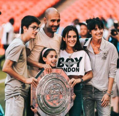 Dolors Sala Carrio son Pep Guardiola with his wife and all three children.